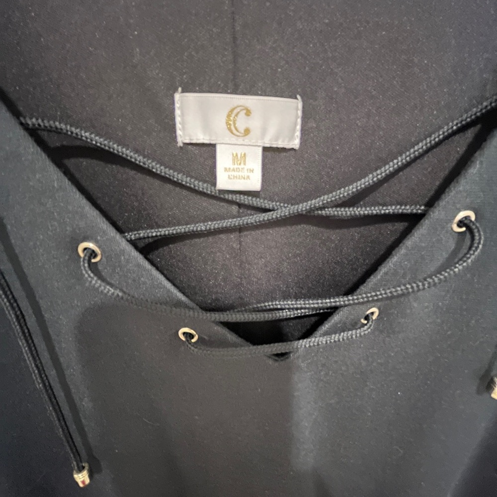 C Black Lace-Up Lined Mini Dress. Two front pockets. - Picture 3 of 3